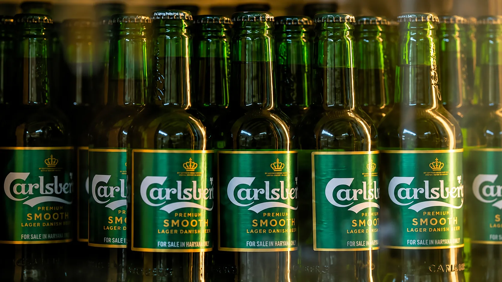 Carlsberg Bottles in Warm Cooler Light.png
