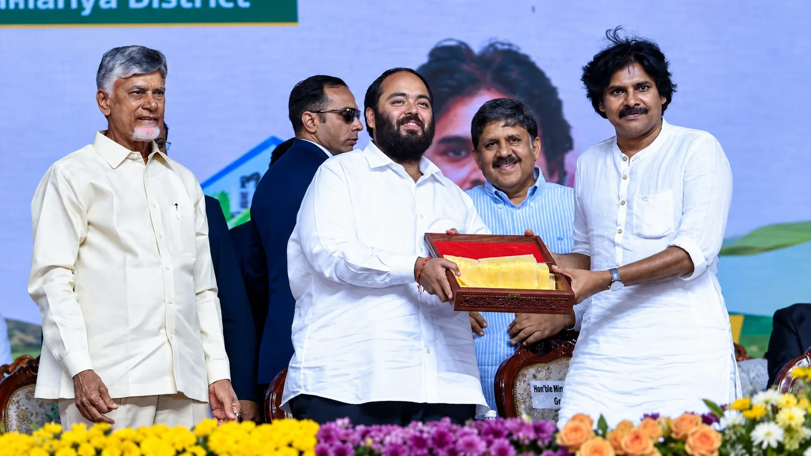Ceremonial Award Presentation on Stage.png